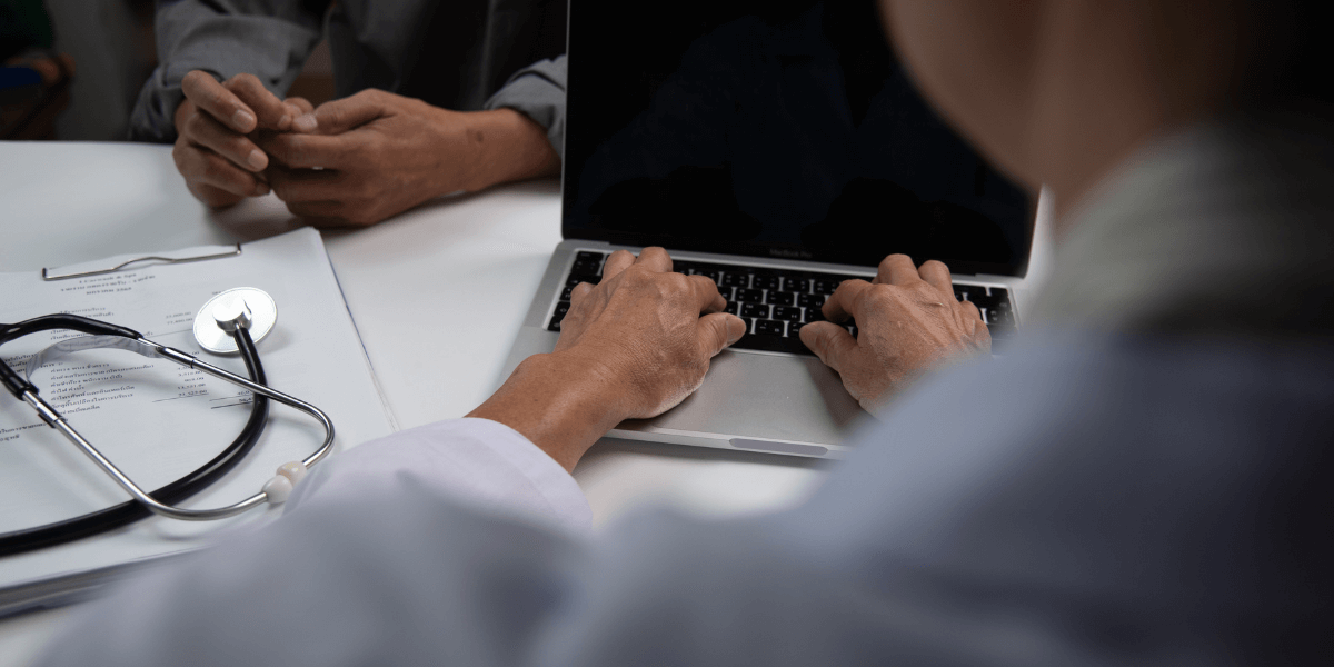 Woman typing on laptop