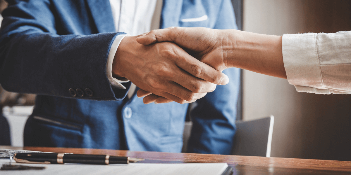 Two people shaking hands | Individual Health Insurance